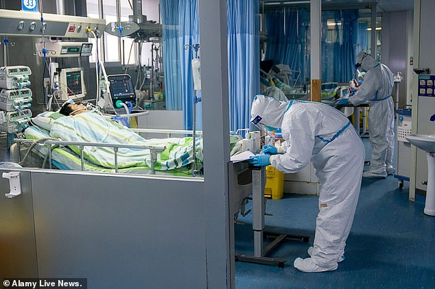 The man is now isolated in a negative-pressure room at Monash Medical Centre in Clayton, where he is in a 'stable condition'. Pictured: Medical staff work in the ICU (intensive care unit) of Zhongnan Hospital of Wuhan University in Wuhan